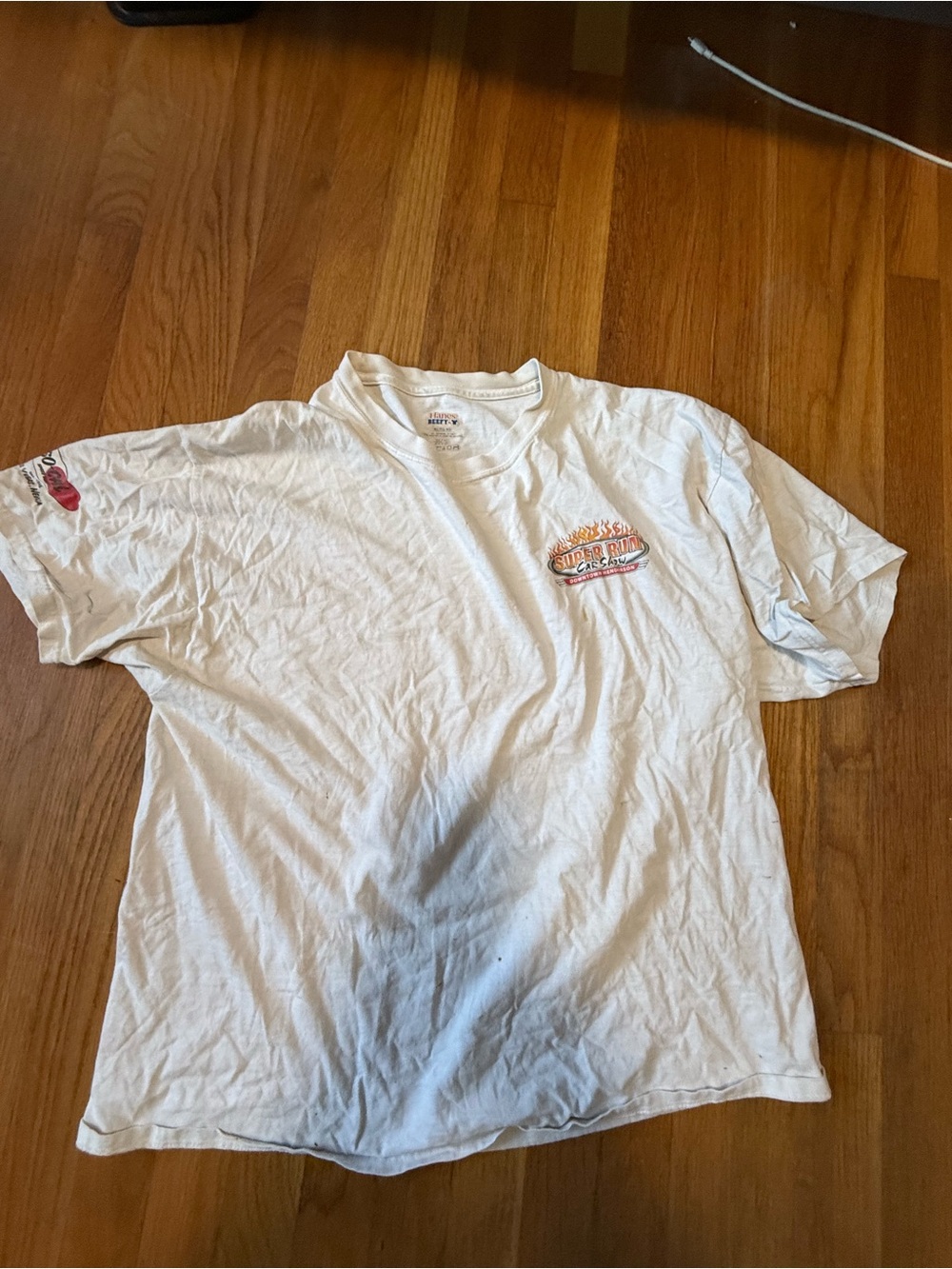 White Graphic Tee with Small Flame Logo